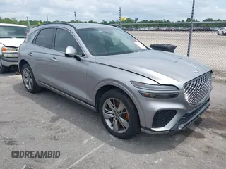 2023 Genesis GV70 Sport z VIN KMUMCDTC9PU093915, wystawiony jako IAAI lot #42147430 z przebiegiem 40 349 mil mil oraz . Historia ofert i sprzedaży dostępna na DreamBid. Obrazek 1.