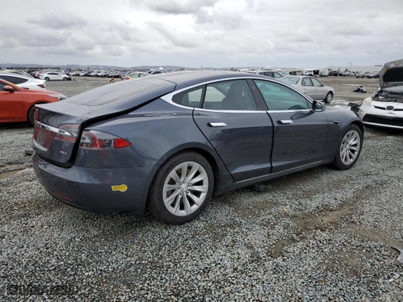 2017 Tesla Model S 100D with VIN 5YJSA1E29HF205514, listed as a Copart auction lot 48915695 with 61,801 mi miles and Salvage Title. Bid and sale history available at carsss.com. Image 3.
