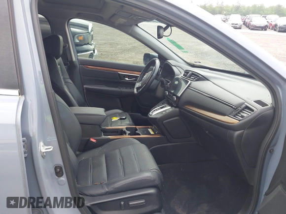 2021 Honda CR-V Touring with VIN 7FART6H91ME022993, listed as a IAAI auction lot 42439344 with 30,477 mi miles and . Bid and sale history available at DreamBid. Image 5.