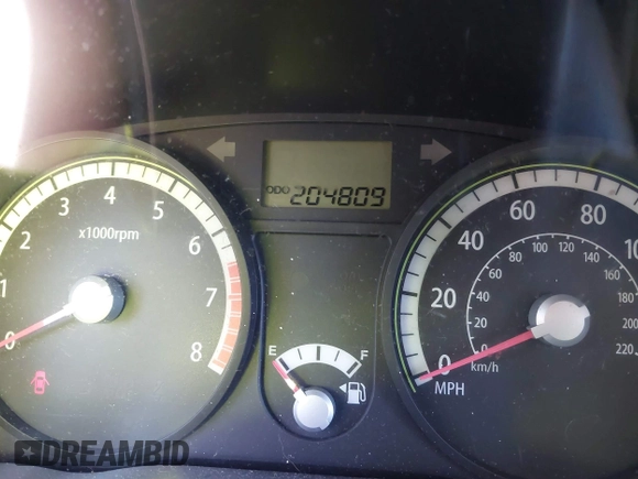 2009 Kia Rio LX with VIN KNADE243696547512, listed as a IAAI auction lot 40639932 with 204,809 mi miles. Bid and sale history available at carsss.com. Image 7.