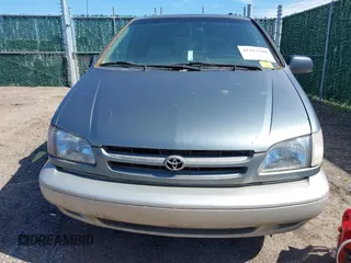 2000 Toyota Sienna LE with VIN 4T3ZF13C6YU173739, listed as a IAAI auction lot 42162320 with 173,659 mi miles. Bid and sale history available at carsss.com. Image 6.