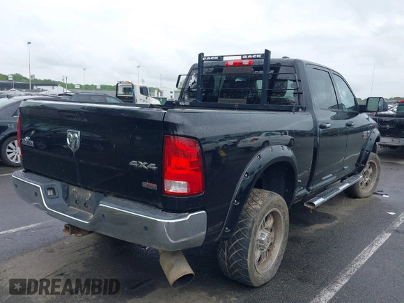 2012 Ram 2500 Big Horn z VIN 3C6UD5DL2CG142378, wystawiony jako IAAI lot #42242505 z przebiegiem Nie podano mil oraz . Historia ofert i sprzedaży dostępna na DreamBid. Obrazek 4.