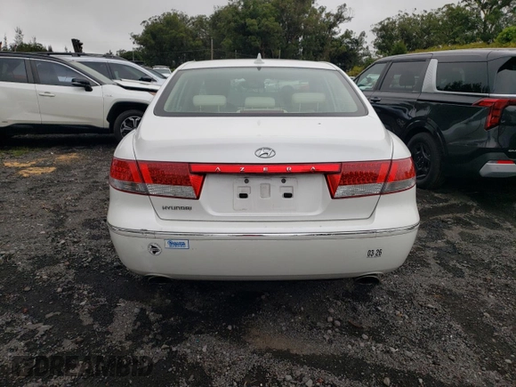 2010 Hyundai Azera GLS z VIN KMHFC4DD4AA513796, wystawiony jako Copart lot #59782965 z przebiegiem 56 958 mil mil oraz Szkoda całkowita • Salvage title. Historia ofert i sprzedaży dostępna na DreamBid. Obrazek 6.