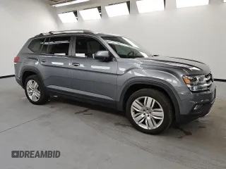 2019 Volkswagen Atlas SE with VIN 1V2UR2CAXKC506569, listed as a Copart auction lot 60248025 with 83,689 mi miles and Clean title. Bid and sale history available at DreamBid. Image 4.