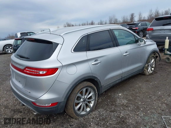 2015 Lincoln MKC with VIN 5LMTJ2AH6FUJ10863, listed as a IAAI auction lot 41983116 with 111,250 mi miles. Bid and sale history available at carsss.com. Image 4.
