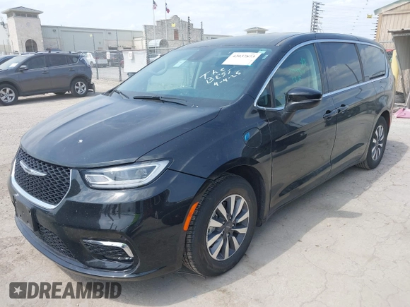 2023 Chrysler Pacifica Hybrid Touring L with VIN 2C4RC1L75PR592251, listed as a IAAI auction lot 42037873 with 44,428 mi miles and . Bid and sale history available at DreamBid. Image 17.