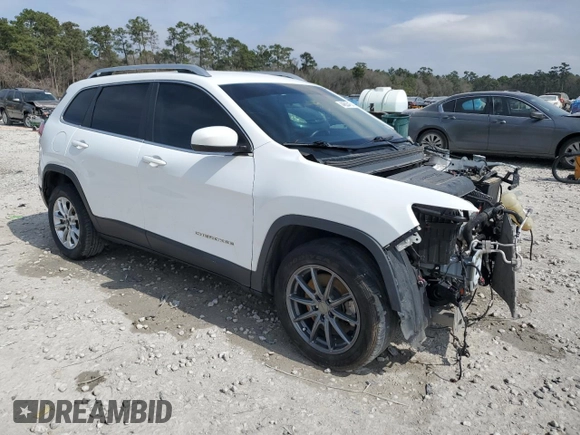 2019 Jeep Cherokee Latitude with VIN 1C4PJLCBXKD344585, listed as a Copart auction lot 44620415 with 91,076 mi miles and Salvage Title. Bid and sale history available at carsss.com. Image 4.