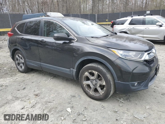 2018 Honda CR-V EX with VIN 2HKRW2H57JH694949, listed as a Copart auction lot 51324315 with 94,470 mi miles and Salvage Title. Bid and sale history available at DreamBid. Image 4.