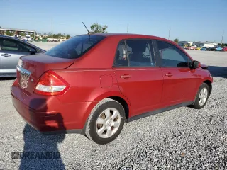 2010 Nissan Versa S with VIN 3N1BC1AP6AL443004, listed as a Copart auction lot 52010495 with 118,801 mi miles and Non Repairable. Bid and sale history available at DreamBid. Image 3.