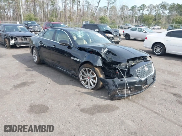 2015 Jaguar XJ with VIN SAJWA1CZ9F8V78228, listed as a IAAI auction lot 41260138 with 52,622 mi miles. Bid and sale history available at carsss.com. Image 1.