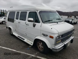 1994 Chevrolet Chevy Van z VIN 1GBEG25K0RF155749, wystawiony jako Copart lot #43805835 z przebiegiem 136 959 mil mil oraz Szkoda całkowita • Salvage title. Historia ofert i sprzedaży dostępna na DreamBid. Obrazek 4.