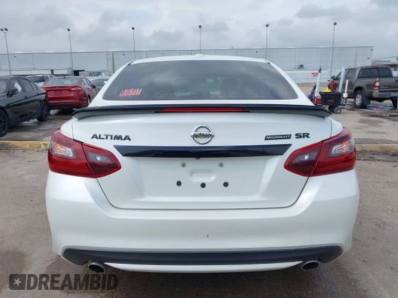 2018 Nissan Altima SR with VIN 1N4AL3AP3JC290863, listed as a IAAI auction lot 41933628 with 121,771 mi miles and . Bid and sale history available at carsss.com. Image 16.