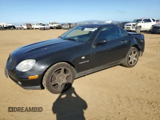 2000 Mercedes-Benz SLK-Class Kompressor with VIN WDBKK47F1YF164000, listed as a Copart auction lot 46366685 with 127,904 mi miles and Salvage Title. Bid and sale history available at carsss.com. Image 1.