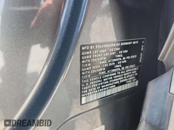 2013 Volkswagen Tiguan SE with VIN WVGBV7AX8DW011356, listed as a Copart auction lot 58099355 with 99,513 mi miles and Salvage title. Bid and sale history available at DreamBid. Image 14.