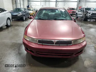 2000 Mitsubishi Galant with VIN 4A3AA46L4YE170903, listed as a Copart auction lot 86874254 with 234,575 mi miles and Salvage Title. Bid and sale history available at DreamBid. Image 5.