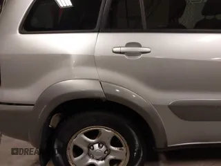 2005 Toyota RAV4 with VIN JTEHD20V250038735, listed as a IAAI auction lot 41853061 with 132,795 mi miles. Bid and sale history available at carsss.com. Image 18.