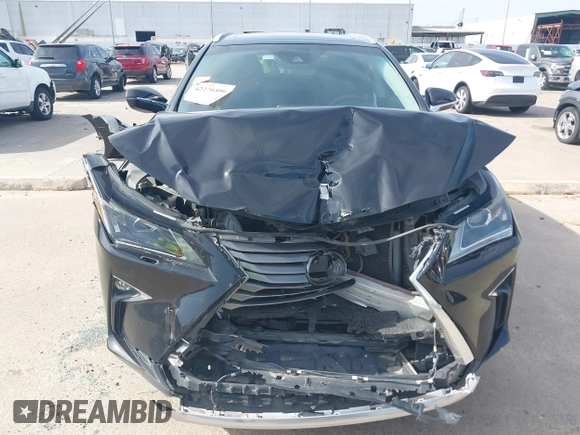 2016 Lexus RX 350 z VIN 2T2BZMCA4GC047800, wystawiony jako IAAI lot #42270406 z przebiegiem 112 181 mil mil oraz . Historia ofert i sprzedaży dostępna na DreamBid. Obrazek 12.