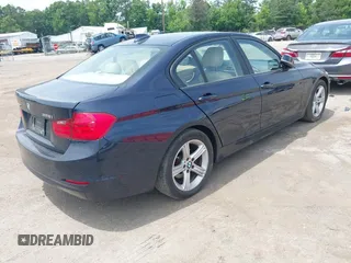 2014 BMW 3 Series 328i xDrive with VIN WBA3B5G51ENS11317, listed as a IAAI auction lot 42494223 with 171,528 mi miles and . Bid and sale history available at DreamBid. Image 4.