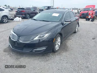 2015 Lincoln MKZ z VIN 3LN6L2JK7FR622029, wystawiony jako IAAI lot #42180170 z przebiegiem 107 732 mil mil oraz . Historia ofert i sprzedaży dostępna na DreamBid. Obrazek 2.