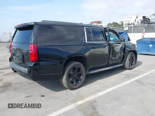 2020 Chevrolet Suburban LT with VIN 1GNSCHKC2LR229759, listed as a IAAI auction lot 42128257 with 46,138 mi miles and . Bid and sale history available at DreamBid. Image 4.