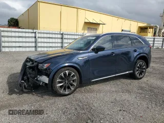 2024 Mazda CX-90 S Premium z VIN JM3KKDHCXR1127023, wystawiony jako Copart lot #47655295 z przebiegiem 6 149 mil mil oraz Czysty tytuł • Clean title. Historia ofert i sprzedaży dostępna na DreamBid. Obrazek 1.