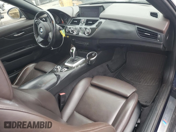 2012 BMW Z4 sDrive35i with VIN WBALM7C56CE384825, listed as a Copart auction lot 53083945 with 87,474 mi miles and Salvage Title. Bid and sale history available at carsss.com. Image 8.