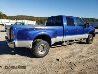 2003 Ford F-350 XL with VIN 1FTWW33P43EB78603, listed as a Copart auction lot 76317284 with 228,798 mi miles and Salvage Title. Bid and sale history available at DreamBid. Image 3.