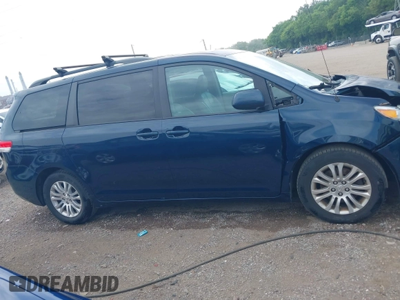 2011 Toyota Sienna XLE AAS with VIN 5TDYK3DC6BS045303, listed as a IAAI auction lot 42515203 with 205,904 mi miles and . Bid and sale history available at DreamBid. Image 13.