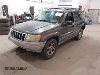 2000 Jeep Grand Cherokee Laredo z VIN 1J4GW48S1YC277710, wystawiony jako IAAI lot #42033564 z przebiegiem Nie podano mil oraz . Historia ofert i sprzedaży dostępna na DreamBid. Obrazek 17.