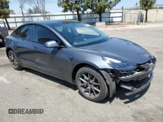 2023 Tesla Model 3 with VIN 5YJ3E1EA4PF615975, listed as a Copart auction lot 58845405 with 38,927 mi miles and Salvage title. Bid and sale history available at DreamBid. Image 4.