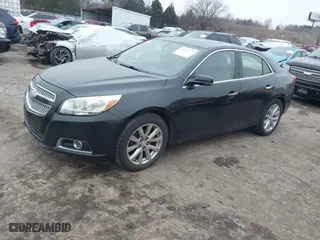 2013 Chevrolet Malibu LTZ with VIN 1G11H5SA1DF123107, listed as a IAAI auction lot 41470772 with 202,752 mi miles. Bid and sale history available at carsss.com. Image 2.