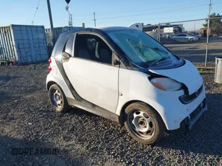 2013 Smart fortwo Pure with VIN WMEEJ3BA5DK703700, listed as a IAAI auction lot 41431239 with 84,733 mi miles. Bid and sale history available at carsss.com. Image 1.