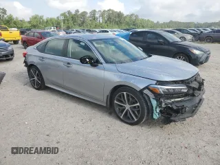 2023 Honda Civic Touring z VIN 2HGFE1F92PH323562, wystawiony jako Copart lot #54060205 z przebiegiem 20 504 mil mil oraz Czysty tytuł • Clean title. Historia ofert i sprzedaży dostępna na DreamBid. Obrazek 4.