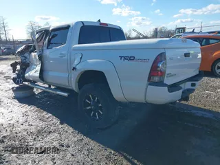 2015 Toyota Tacoma with VIN 3TMLU4EN8FM200529, listed as a IAAI auction lot 41602598 with 98,456 mi miles and . Bid and sale history available at DreamBid. Image 3.