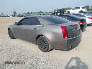 2012 Cadillac CTS Luxury with VIN 1G6DE5E5XC0137961, listed as a IAAI auction lot 42504953 with 179,263 mi miles and . Bid and sale history available at DreamBid. Image 3.