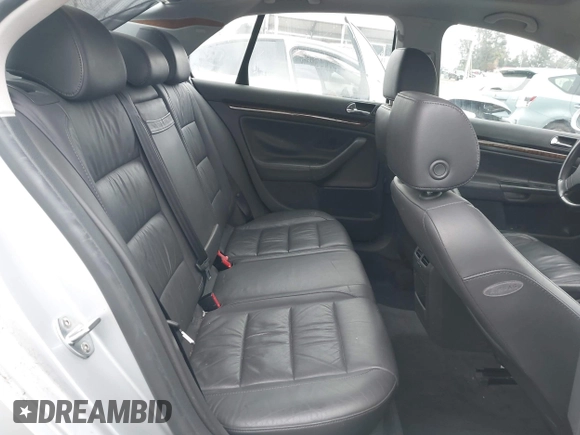 2005 Volkswagen Jetta z VIN 3VWDG71K85M603060, wystawiony jako IAAI lot #42106030 z przebiegiem 152 666 mil mil oraz . Historia ofert i sprzedaży dostępna na DreamBid. Obrazek 8.