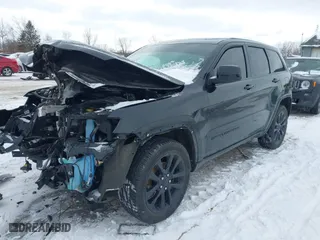 2018 Jeep Grand Cherokee Laredo E with VIN 1C4RJFAG0JC203148, listed as a IAAI auction lot 41614678 with 118,500 mi miles. Bid and sale history available at carsss.com. Image 18.