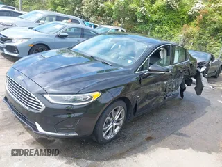 2019 Ford Fusion SEL with VIN 3FA6P0CD5KR182520, listed as a IAAI auction lot 42014190 with 107,028 mi miles and . Bid and sale history available at carsss.com. Image 18.