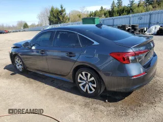 2022 Honda Civic LX z VIN 2HGFE2F26NH131275, wystawiony jako Copart lot #56547825 z przebiegiem 4205 mil mil oraz Czysty tytuł • Clean title. Historia ofert i sprzedaży dostępna na DreamBid. Obrazek 2.