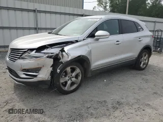 2017 Lincoln MKC Premiere with VIN 5LMCJ1C91HUL32617, listed as a Copart auction lot 57444215 with 106,285 mi miles and Salvage title. Bid and sale history available at DreamBid. Image 1.