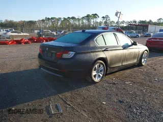 2013 BMW 5 Series 528i with VIN WBAXG5C56DDY31724, listed as a IAAI auction lot 41530179 with 117,876 mi miles and . Bid and sale history available at carsss.com. Image 4.