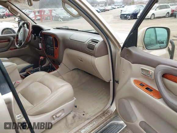 1999 Lexus LX 470 z VIN JT6HT00W8X0045705, wystawiony jako IAAI lot #42005587 z przebiegiem 443 758 mil mil oraz . Historia ofert i sprzedaży dostępna na DreamBid. Obrazek 5.
