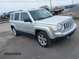 2014 Jeep Patriot Latitude with VIN 1C4NJPFB8ED509998, listed as a IAAI auction lot 42617341 with 72,200 mi miles and . Bid and sale history available at DreamBid. Image 1.