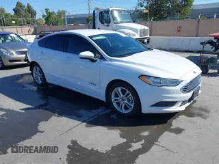 2018 Ford Fusion S z VIN 3FA6P0UU5JR122606, wystawiony jako IAAI lot #42239394 z przebiegiem 88 148 mil mil oraz . Historia ofert i sprzedaży dostępna na DreamBid. Obrazek 1.