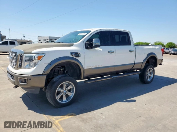 2017 Nissan Titan Pro-4X z VIN 1N6BA1F42HN575024, wystawiony jako Copart lot #52025835 z przebiegiem 23 422 mil mil oraz Czysty tytuł • Clean title. Historia ofert i sprzedaży dostępna na DreamBid. Obrazek 1.