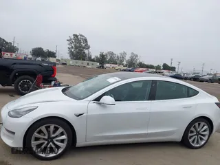 2020 Tesla Model 3 Standard Range Plus z VIN 5YJ3E1EAXLF806438, wystawiony jako IAAI lot #42104964 z przebiegiem 89 065 mil mil oraz . Historia ofert i sprzedaży dostępna na DreamBid. Obrazek 14.