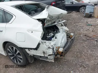 2018 Nissan Altima SR with VIN 1N4AL3AP7JC174856, listed as a IAAI auction lot 42070366 with 135,680 mi miles and . Bid and sale history available at carsss.com. Image 17.