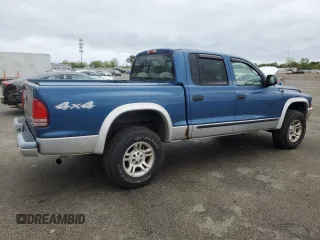2004 Dodge Dakota SLT z VIN 1D7HG48K04S739865, wystawiony jako Copart lot #57867265 z przebiegiem 214 698 mil mil oraz Tytuł czysty. Historia ofert i sprzedaży dostępna na DreamBid. Obrazek 3.