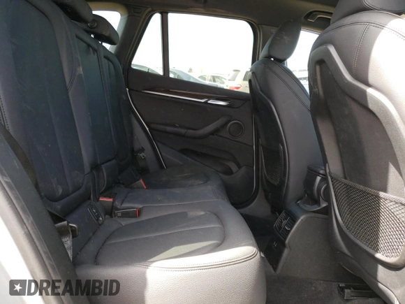 2018 BMW X1 sDrive28i with VIN WBXHU7C38J3H42948, listed as a Copart auction lot 52061793 with 26,991 mi miles and . Bid and sale history available at DreamBid. Image 10.