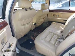 1995 Cadillac DeVille z VIN 1G6KD52BXSU278072, wystawiony jako IAAI lot #42036812 z przebiegiem 149 180 mil mil oraz . Historia ofert i sprzedaży dostępna na DreamBid. Obrazek 8.